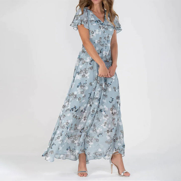 Blommig klänning - V-ringad med fjärilsärm - Maxi sommarklänning-Eva Jonsson