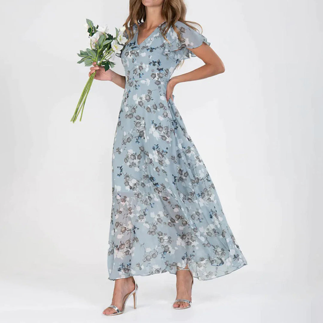 Blommig klänning - V-ringad med fjärilsärm - Maxi sommarklänning-Eva Jonsson