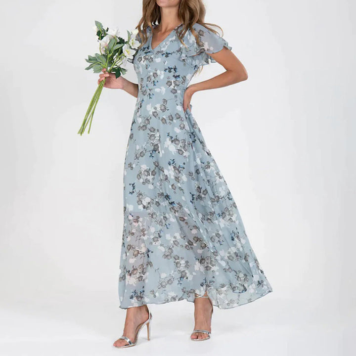 Blommig klänning - V-ringad med fjärilsärm - Maxi sommarklänning-Eva Jonsson