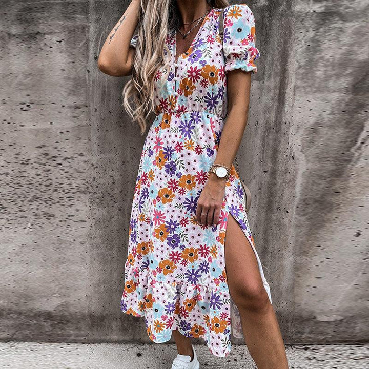 Blommig klänning – kortärmad – slits – midiklänning – sommarklänning-Eva Jonsson