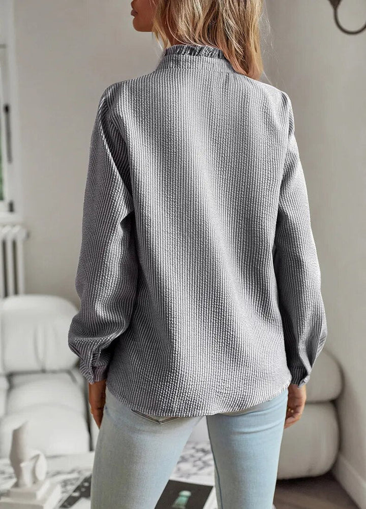 Blus med volanger - Långärmad - Löst sittande - Knäppta toppar - Knäppt skjorta Dam-Eva Jonsson