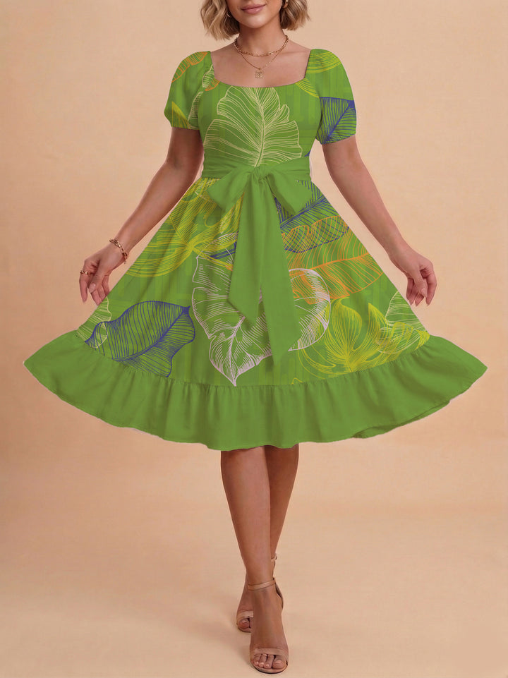 Dam A-linje klänning med blommönster och justerbart bälte Mirla-Eva Jonsson