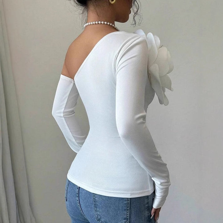 Dam Body med elegant Bloom-applikation och lång ärm Mirla-Eva Jonsson