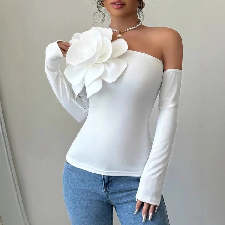 Dam Body med elegant Bloom-applikation och lång ärm Mirla-Eva Jonsson