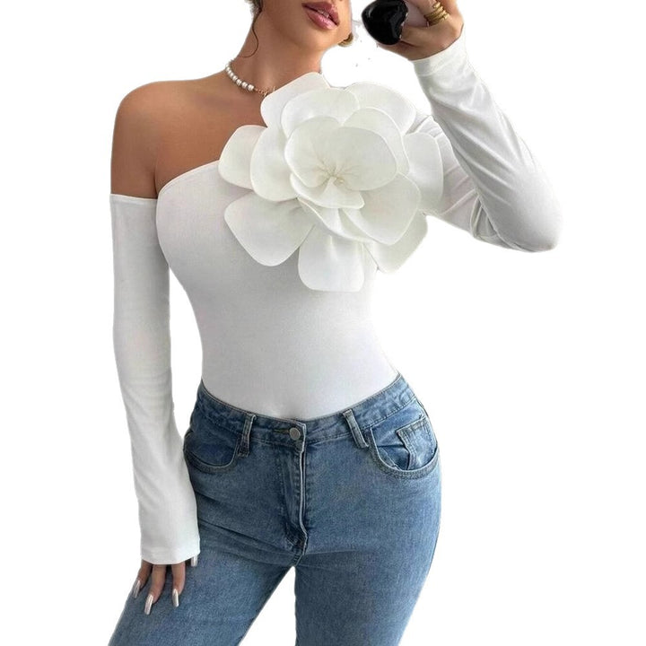 Dam Body med elegant Bloom-applikation och lång ärm Mirla-Eva Jonsson