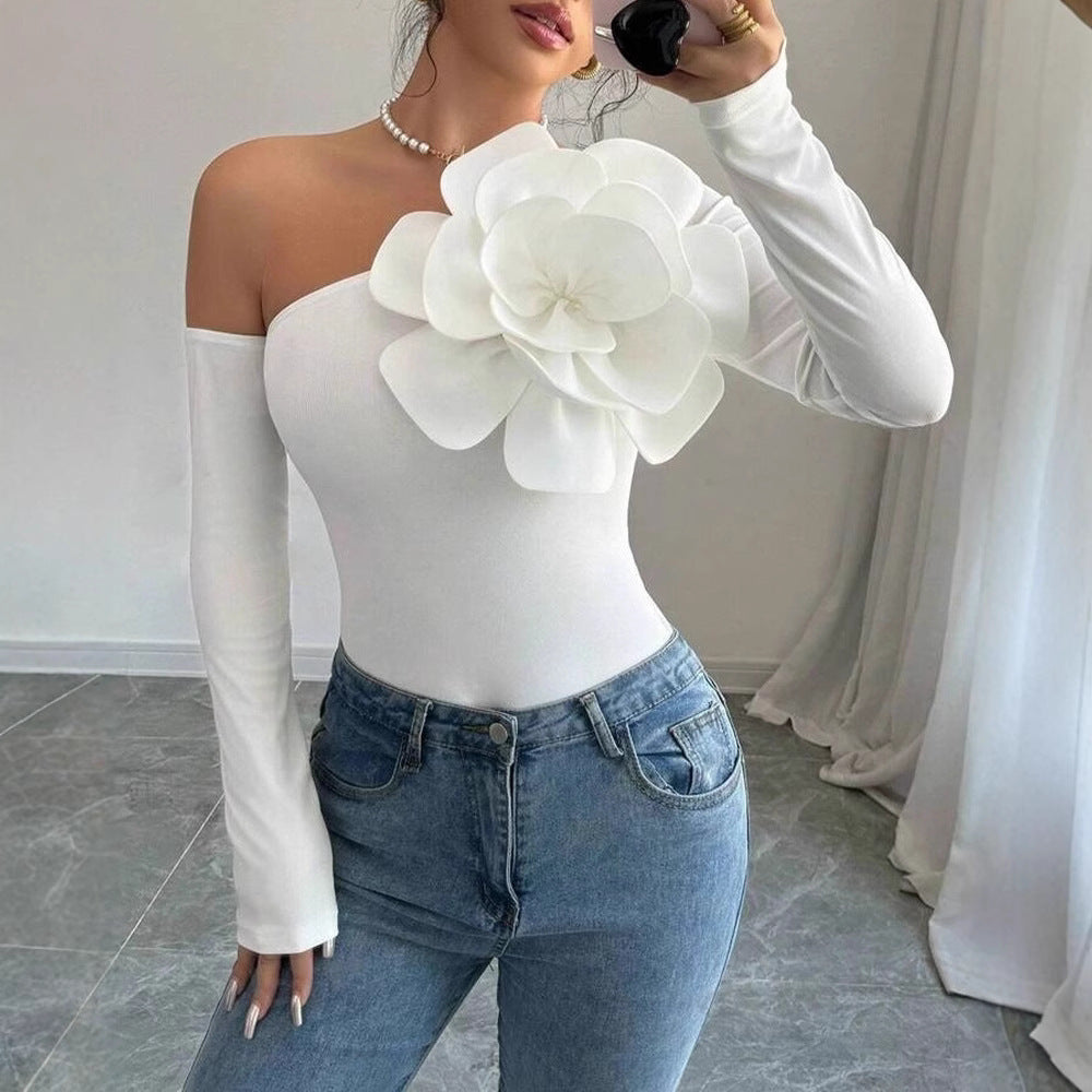 Dam Body med elegant Bloom-applikation och lång ärm Mirla-Eva Jonsson