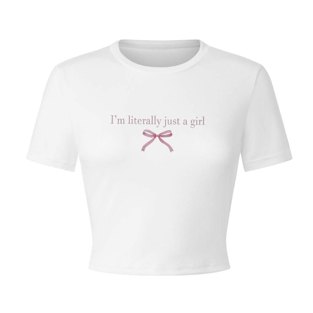 Dam Crop-T-shirt med kreativt tryck och rosett detalj Mirla-Eva Jonsson