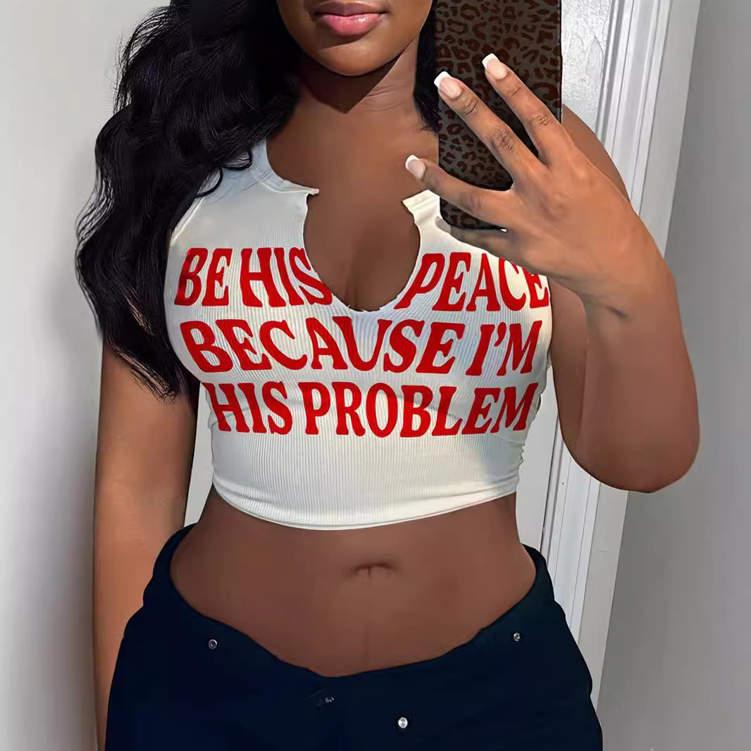 Dam Crop-Top med iögonfallande text och lös passform Mirla-Eva Jonsson