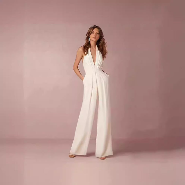 Dam Elegant Jumpsuit med Djup V-Hals och Bred Ben Mirla-Eva Jonsson
