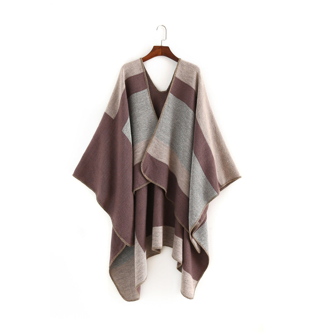 Dam Elegant Oversized Poncho av Högkvalitativt Material med Modernt Randmönster Mirla-Eva Jonsson