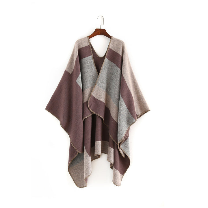 Dam Elegant Oversized Poncho av Högkvalitativt Material med Modernt Randmönster Mirla-Eva Jonsson