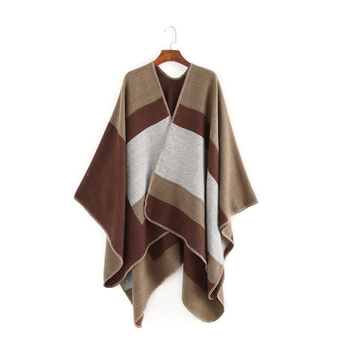 Dam Elegant Oversized Poncho av Högkvalitativt Material med Modernt Randmönster Mirla-Eva Jonsson