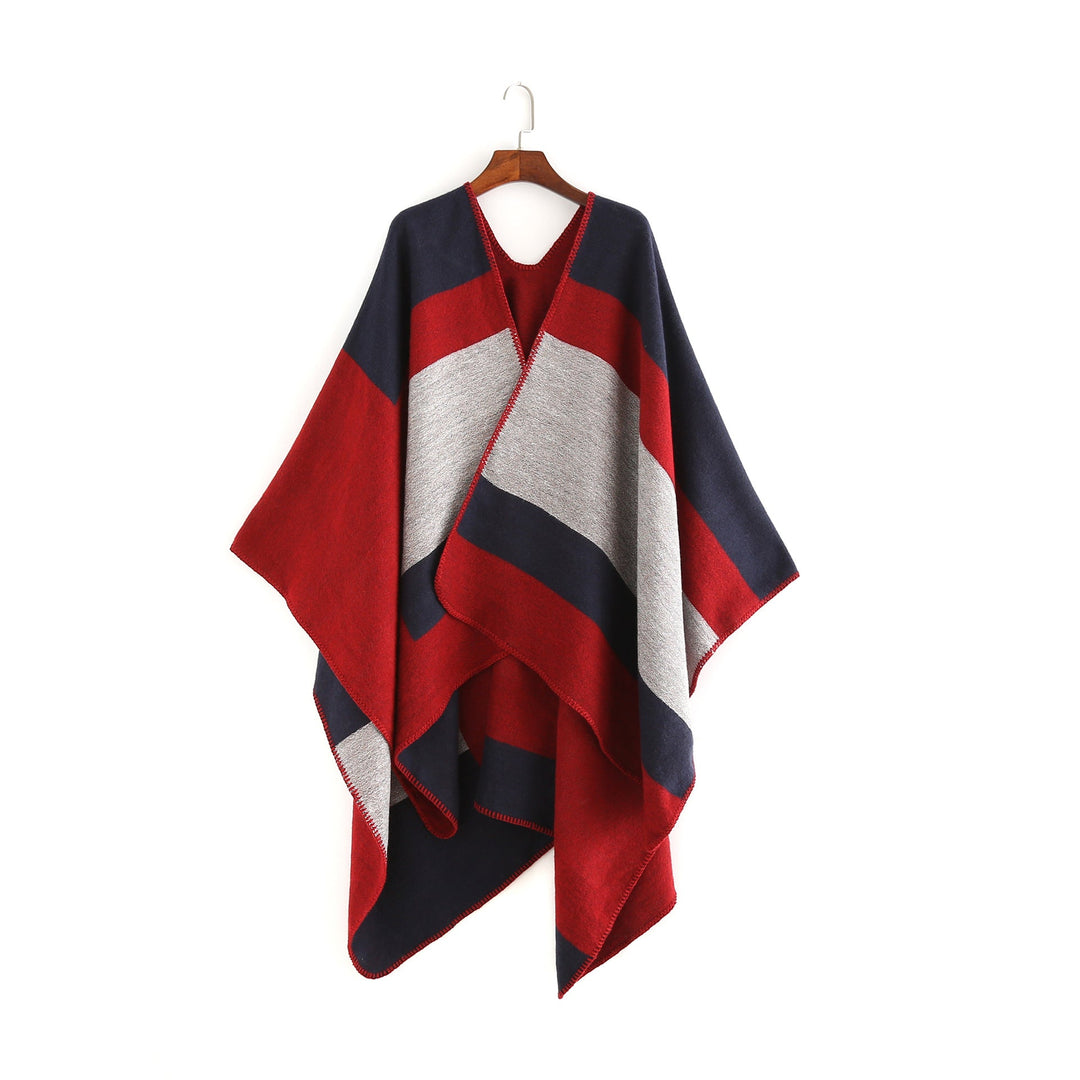 Dam Elegant Oversized Poncho av Högkvalitativt Material med Modernt Randmönster Mirla-Eva Jonsson