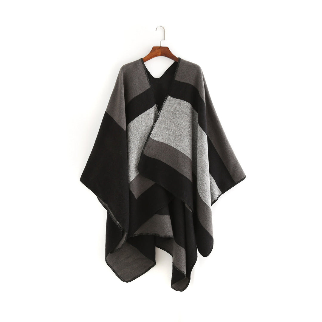 Dam Elegant Oversized Poncho av Högkvalitativt Material med Modernt Randmönster Mirla-Eva Jonsson