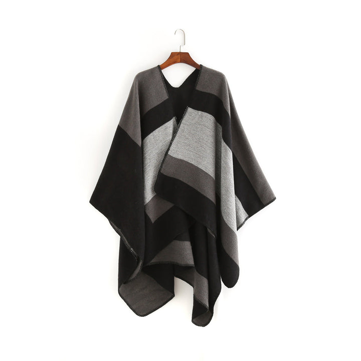 Dam Elegant Oversized Poncho av Högkvalitativt Material med Modernt Randmönster Mirla-Eva Jonsson