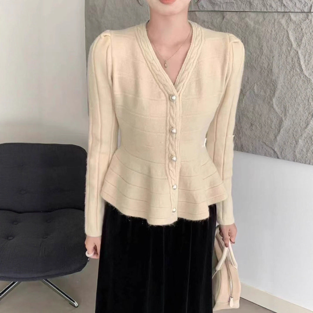 Dam Elegant Stickad Jacka med Strukturerad Design och Feminina Puffärmar Mirla-Eva Jonsson