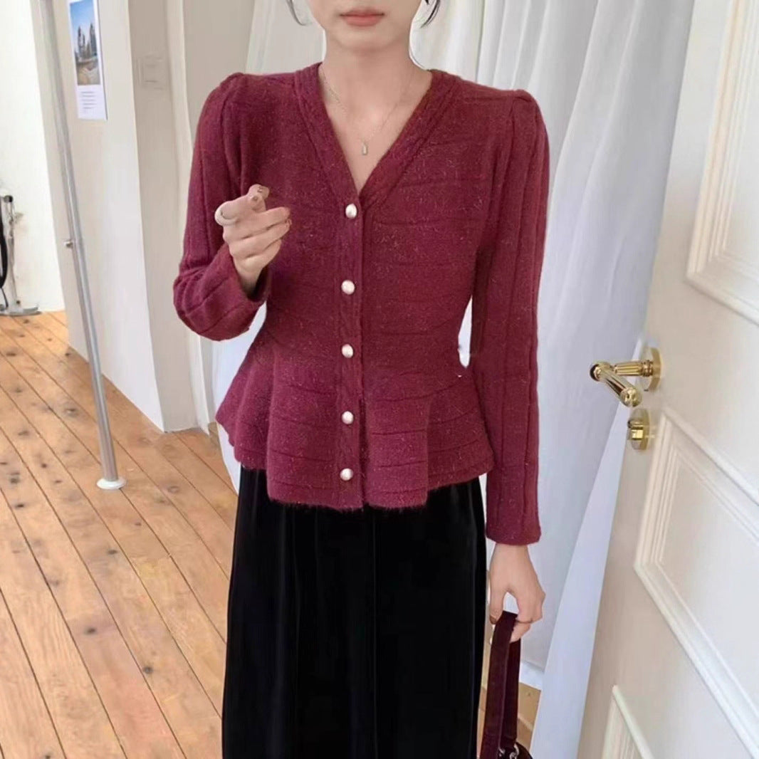 Dam Elegant Stickad Jacka med Strukturerad Design och Feminina Puffärmar Mirla-Eva Jonsson