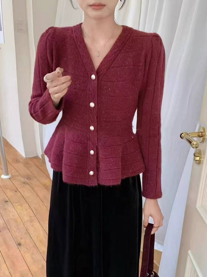 Dam Elegant Stickad Jacka med Strukturerad Design och Feminina Puffärmar Mirla-Eva Jonsson