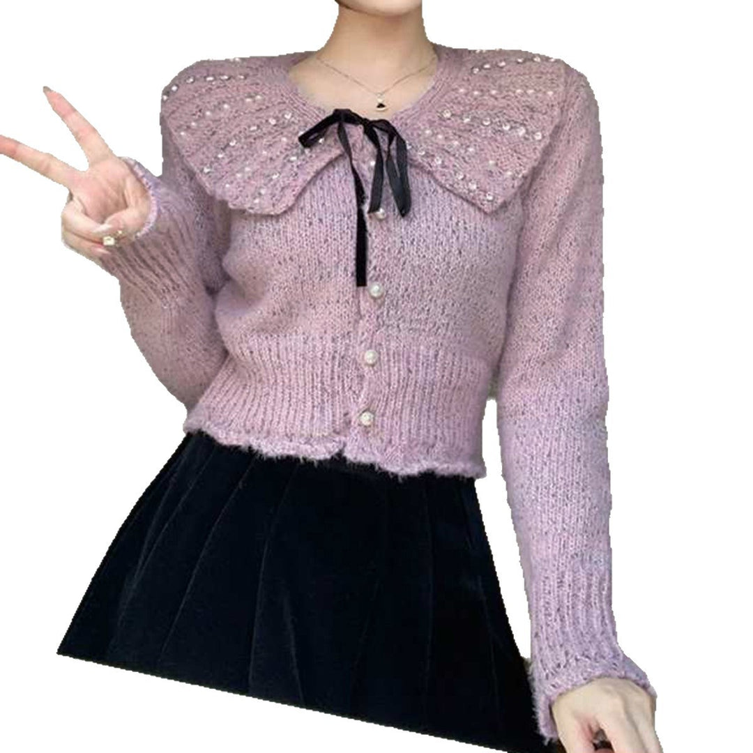 Dam Elegant Stickad Topp med Volangkrage och Dekorativa Pärlor Mirla-Eva Jonsson