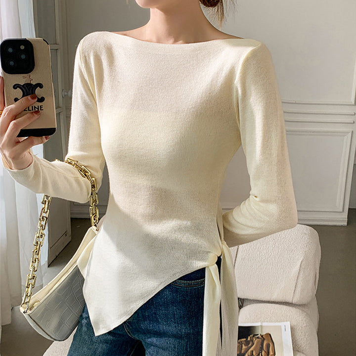 Dam Elegant Topp med Asymmetrisk Cut och Dekorativ Knut Mirla-Eva Jonsson
