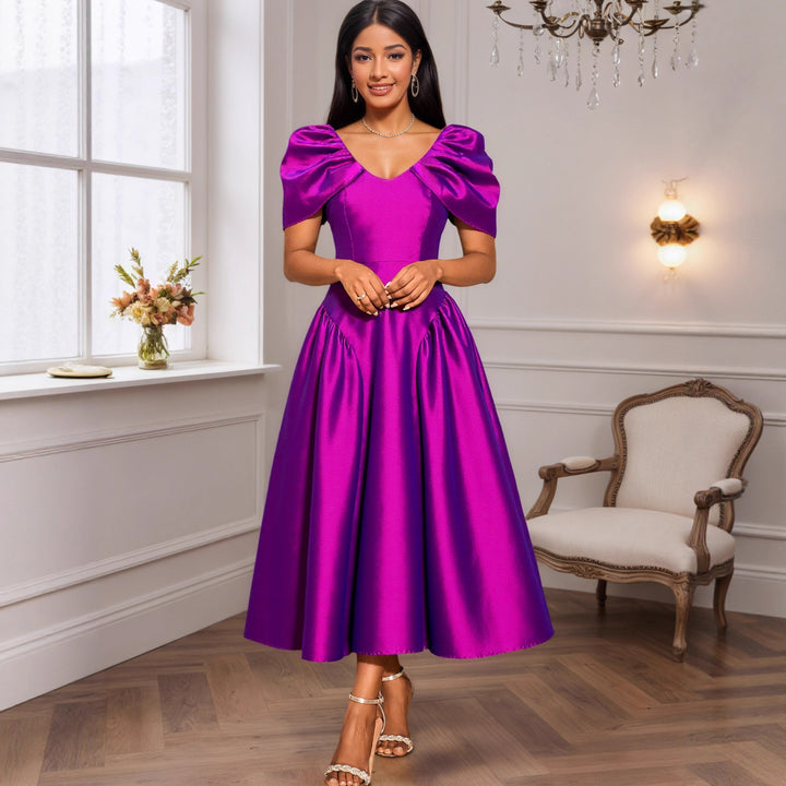 Dam Eleganta Satinklänning med voluminösa puffärmar Mirla-Eva Jonsson