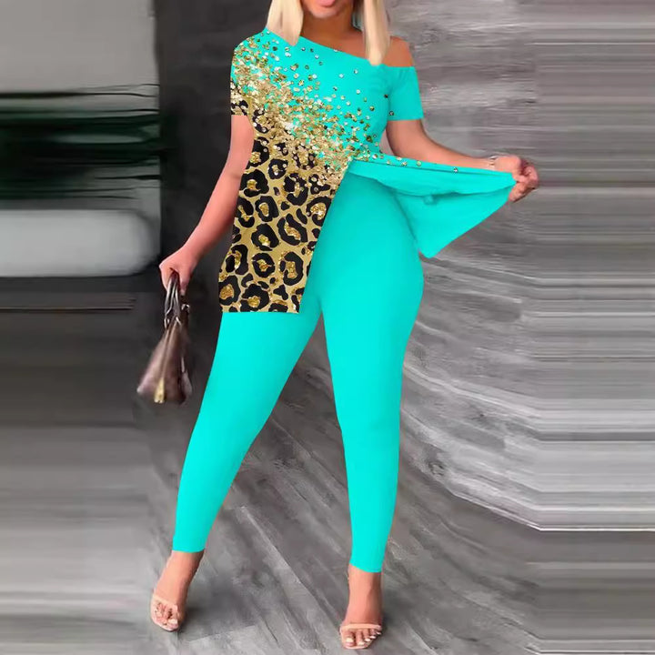 Dam Figurformad Jumpsuit med Off-Shoulder Design och Glamourösa Accenter Mirla-Eva Jonsson