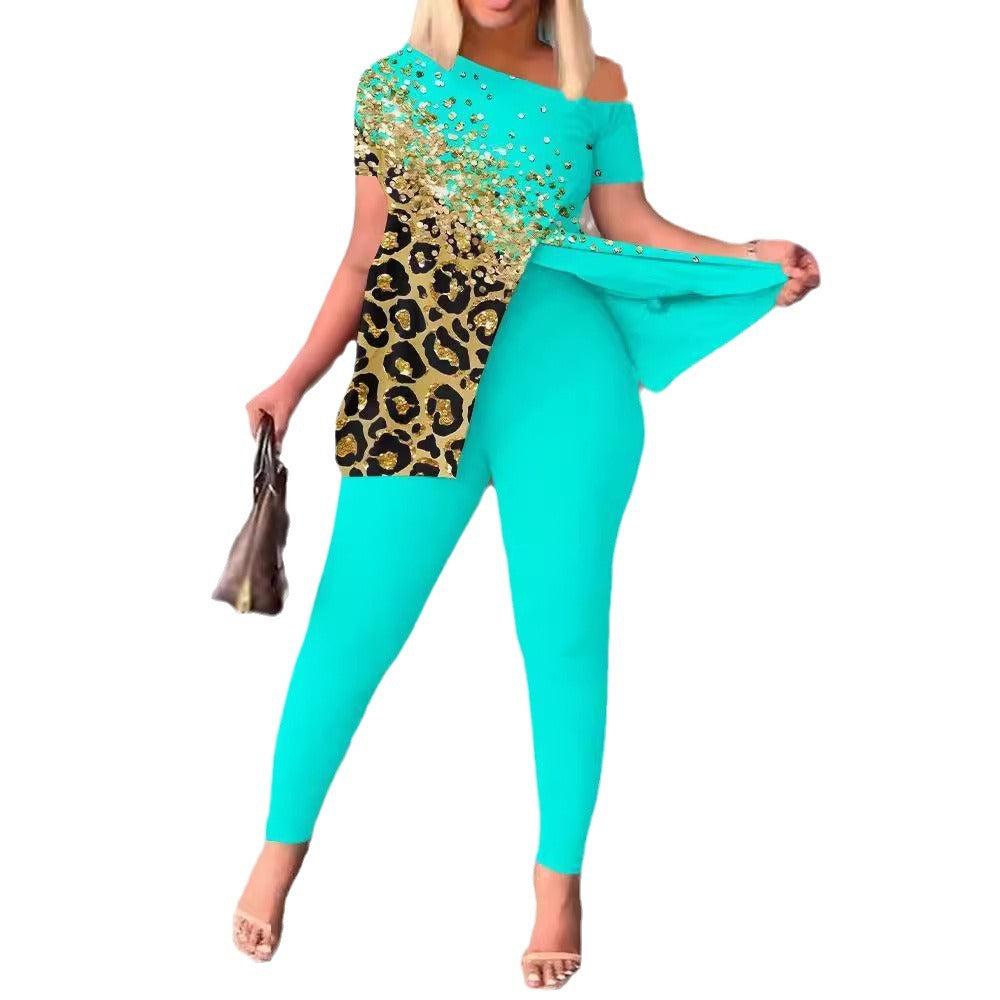 Dam Figurformad Jumpsuit med Off-Shoulder Design och Glamourösa Accenter Mirla-Eva Jonsson