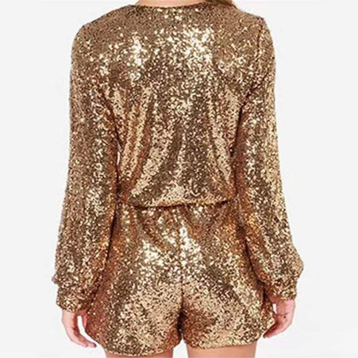 Dam Glittrande Jumpsuit med Djup V-ringning och Funkande Paljetter Mirla-Eva Jonsson