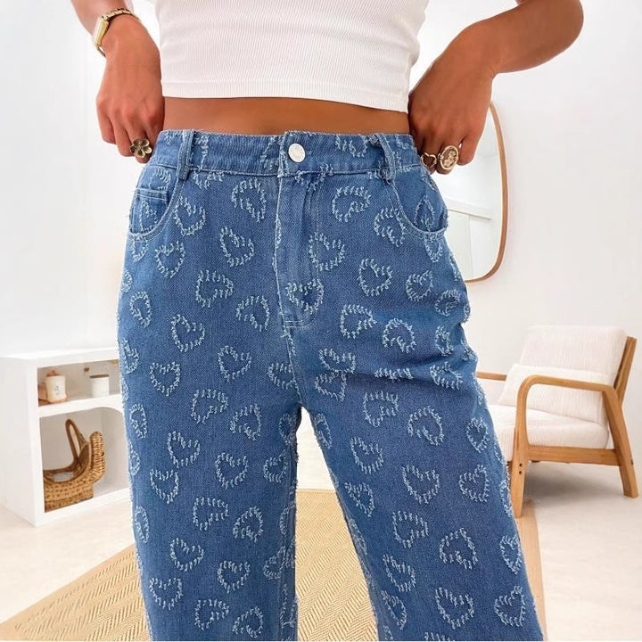 Dam Högmidjade Jeans med unikt hjärtmönster och bekväm passform-Eva Jonsson