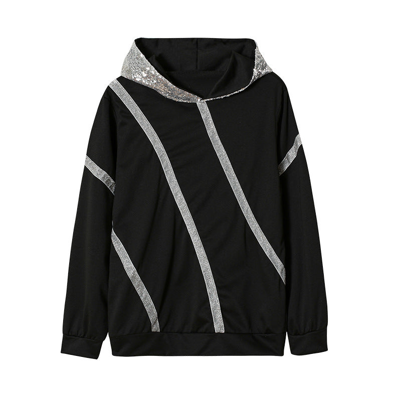 Dam Hoodie med glittersatser och modern skärning Mirla-Eva Jonsson