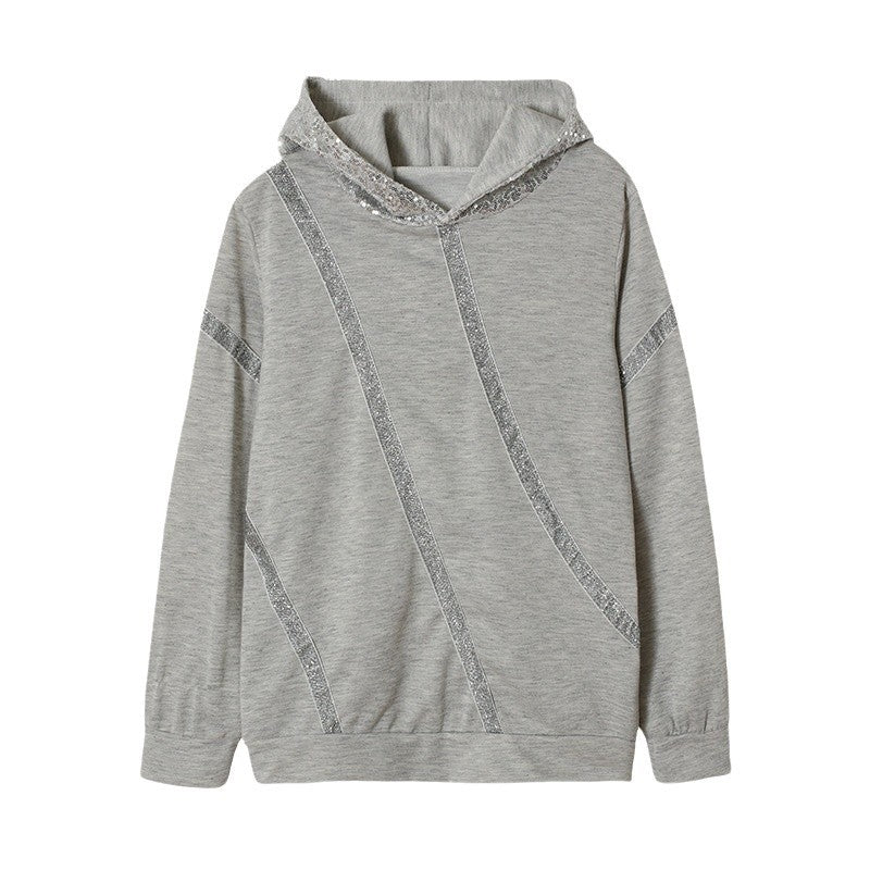 Dam Hoodie med glittersatser och modern skärning Mirla-Eva Jonsson