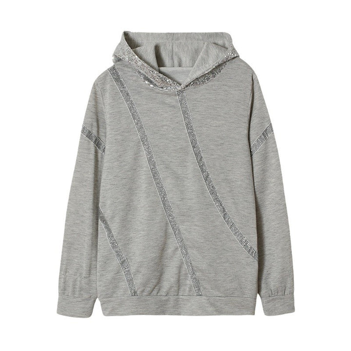 Dam Hoodie med glittersatser och modern skärning Mirla-Eva Jonsson