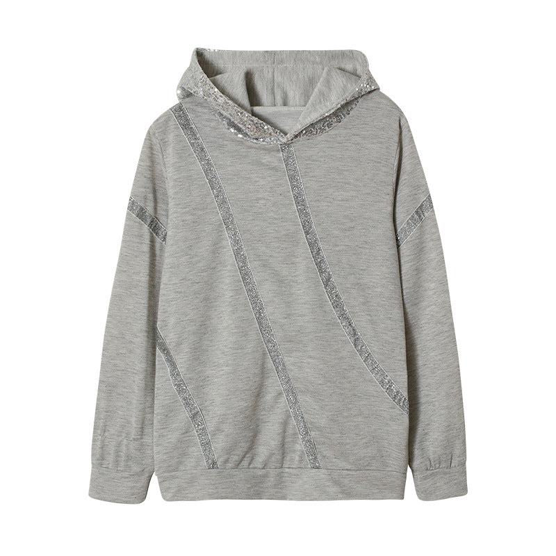 Dam Hoodie med glittersatser och modern skärning Mirla-Eva Jonsson