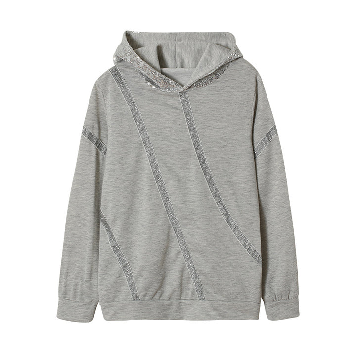 Dam Hoodie med glittersatser och modern skärning Mirla-Eva Jonsson