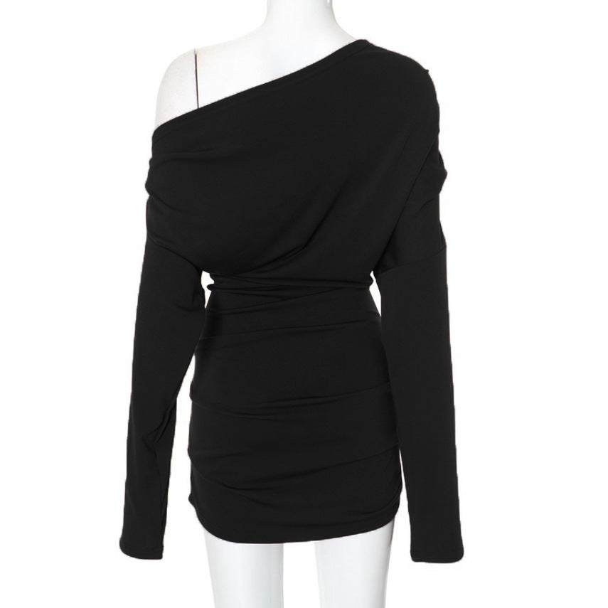 Dam Longsleeve topp med asymmetrisk cut och raffinerad draperingseffekt Mirla-Eva Jonsson