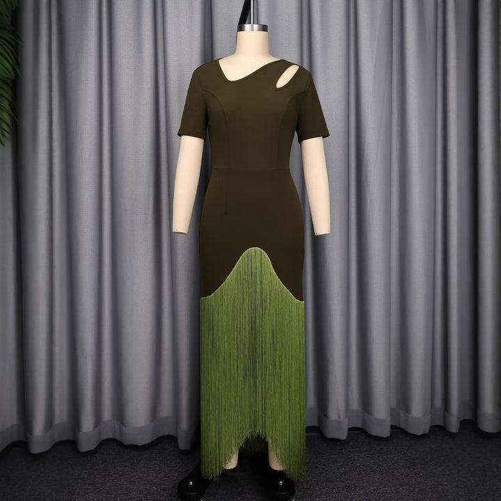 Dam Maxi dress med asymmetrisk nederdel och elegant cut-out design Mirla-Eva Jonsson