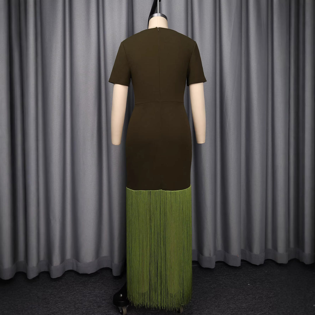 Dam Maxi dress med asymmetrisk nederdel och elegant cut-out design Mirla-Eva Jonsson