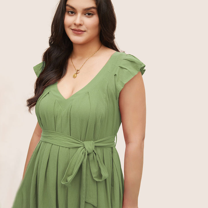 Dam Maxi dress med flödande kjol och dekorativa volangdetaljer Mirla-Eva Jonsson