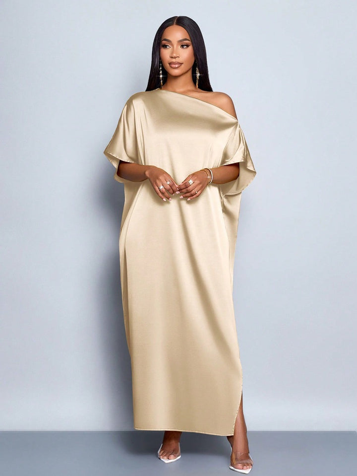 Dam Maxi klänning med asymmetrisk skärning och elegant fall Mirla-Eva Jonsson