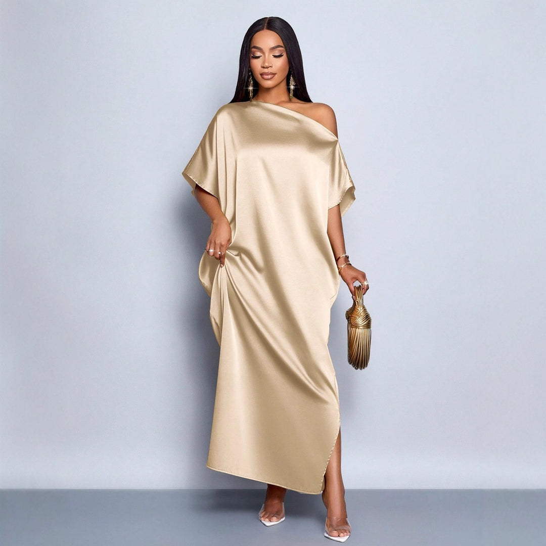 Dam Maxi klänning med asymmetrisk skärning och elegant fall Mirla-Eva Jonsson