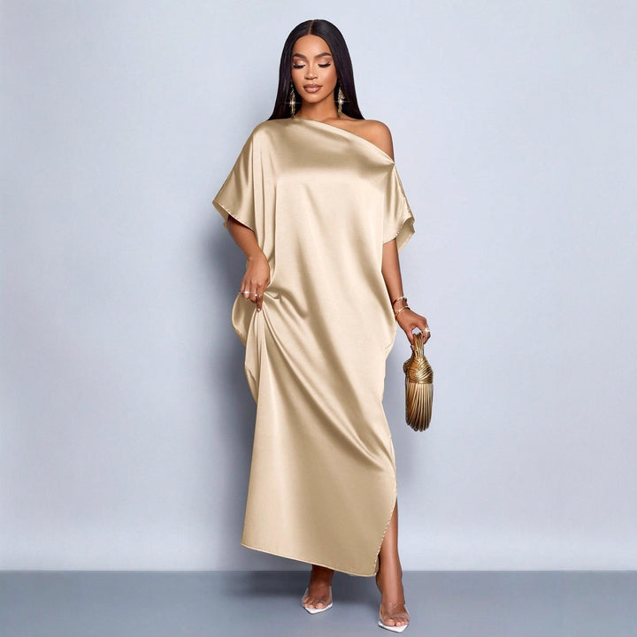 Dam Maxi klänning med asymmetrisk skärning och elegant fall Mirla-Eva Jonsson
