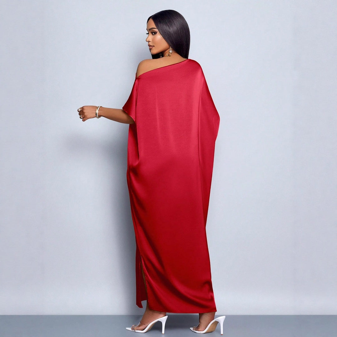 Dam Maxi klänning med asymmetrisk skärning och elegant fall Mirla-Eva Jonsson
