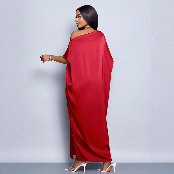 Dam Maxi klänning med asymmetrisk skärning och elegant fall Mirla-Eva Jonsson