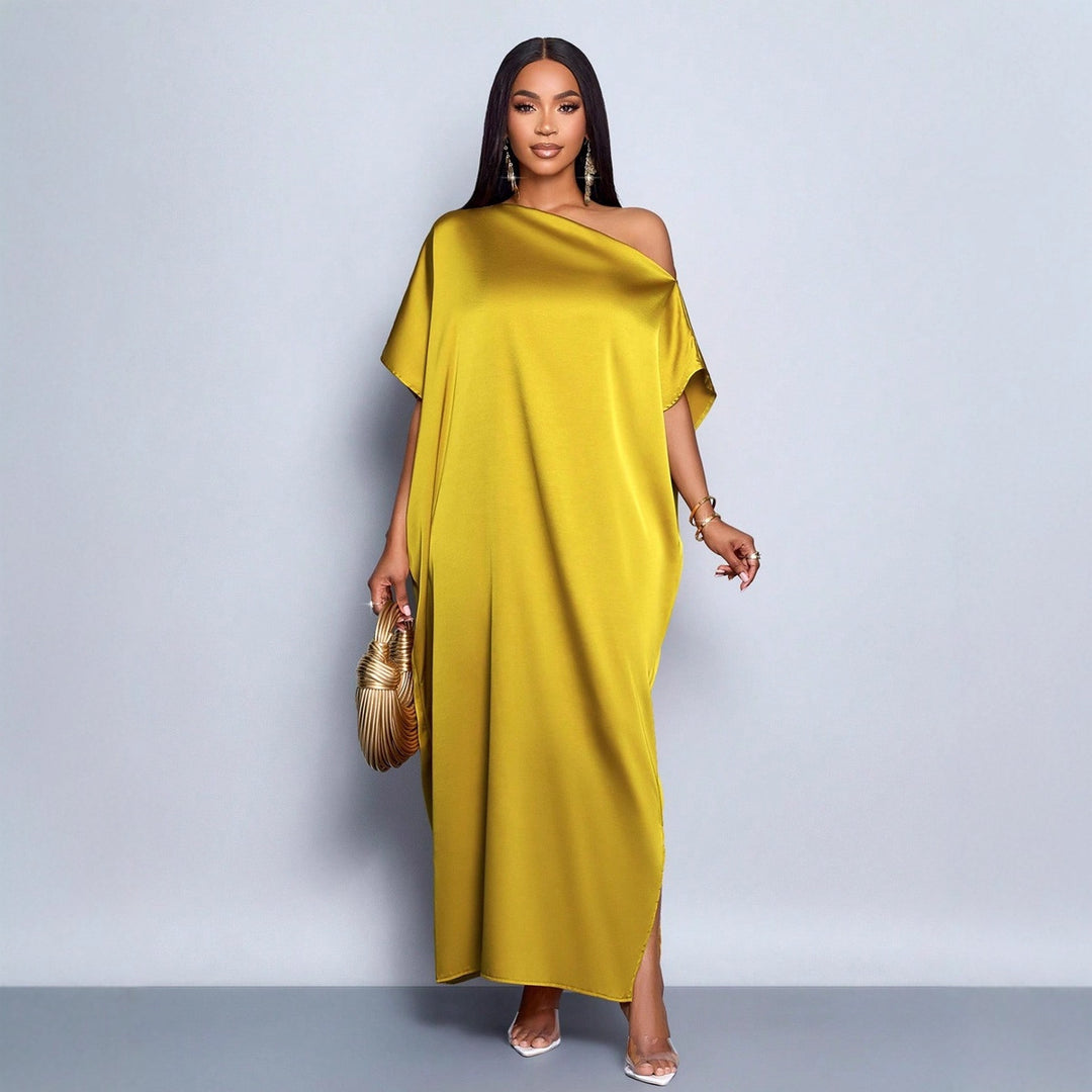 Dam Maxi klänning med asymmetrisk skärning och elegant fall Mirla-Eva Jonsson