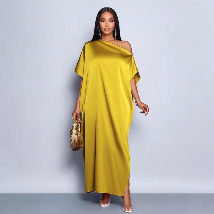 Dam Maxi klänning med asymmetrisk skärning och elegant fall Mirla-Eva Jonsson