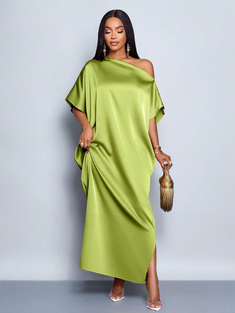 Dam Maxi klänning med asymmetrisk skärning och elegant fall Mirla-Eva Jonsson