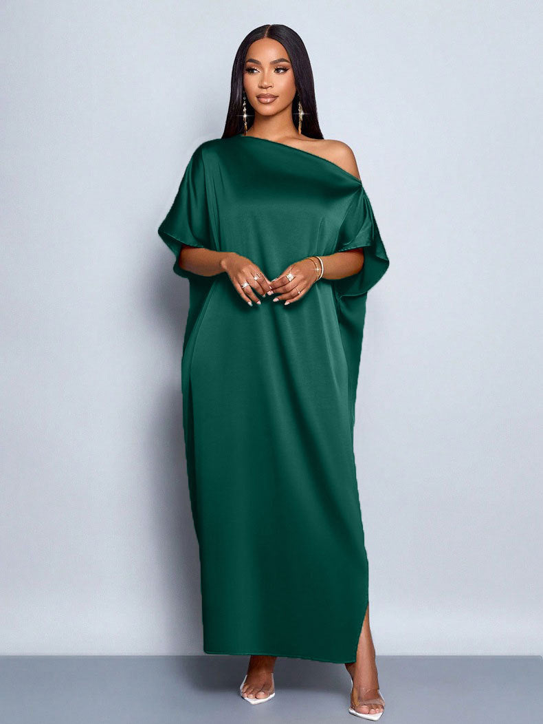 Dam Maxi klänning med asymmetrisk skärning och elegant fall Mirla-Eva Jonsson