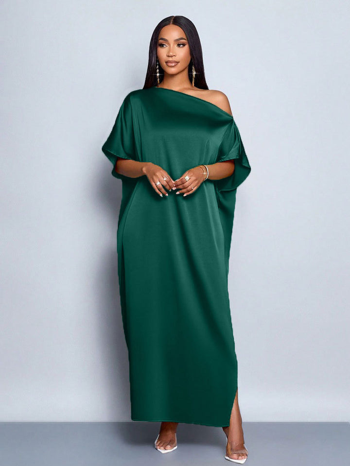 Dam Maxi klänning med asymmetrisk skärning och elegant fall Mirla-Eva Jonsson