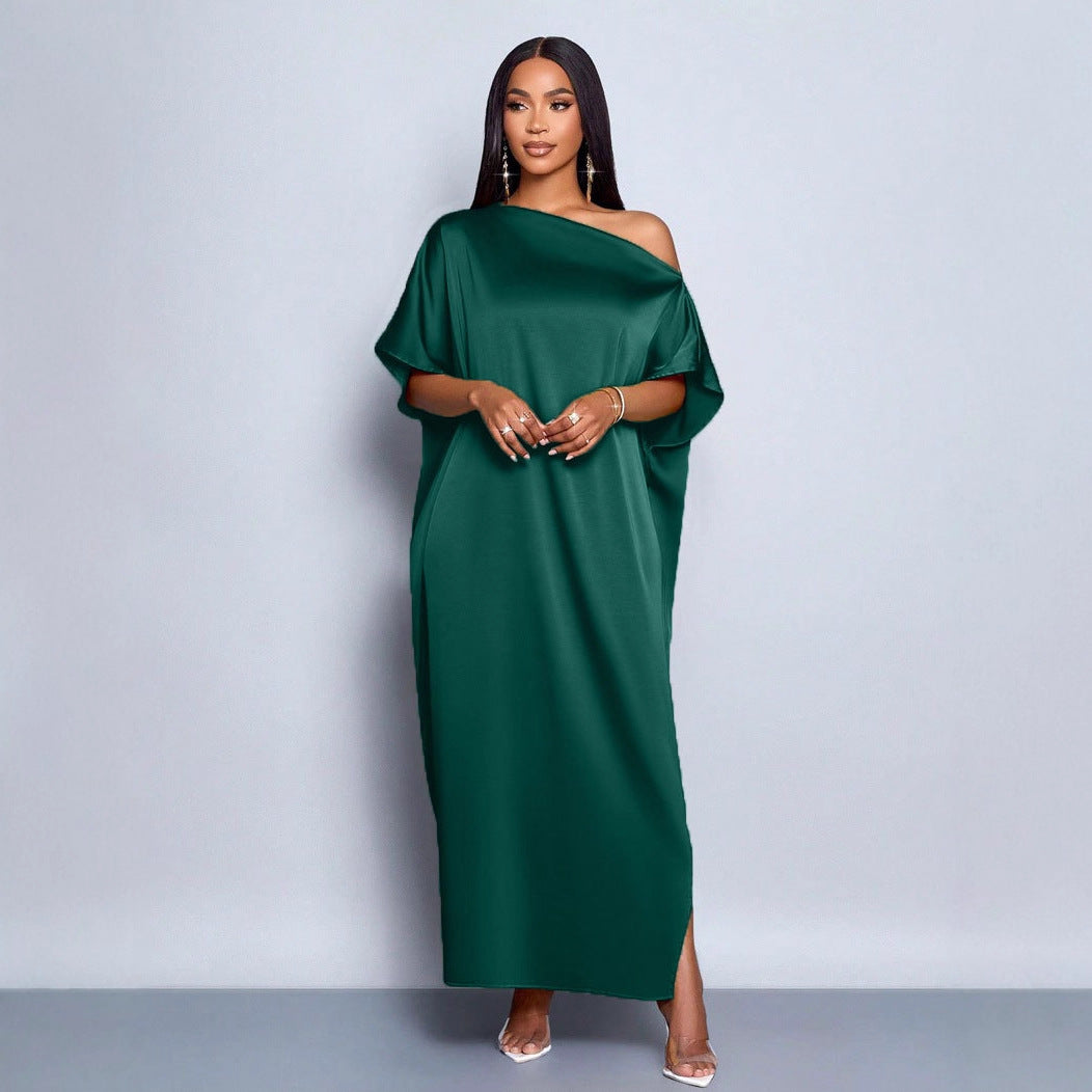 Dam Maxi klänning med asymmetrisk skärning och elegant fall Mirla-Eva Jonsson