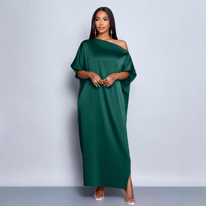 Dam Maxi klänning med asymmetrisk skärning och elegant fall Mirla-Eva Jonsson